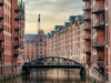 panoramic view of canal and historic buildings in old warehouse district Speicherstadt in Hamburg panoramic view of canal and historic buildings in old warehouse district Speicherstadt in Hamburg