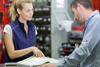 saleswoman helps customer