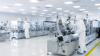 Sterile High Precision Manufacturing Laboratory where Scientists in Protective Coverall's 