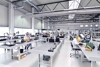 workers in a factory for the production of electronics - modern industrial enterprise