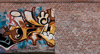 Ziegelwand_Graffiti_ret_23x17_300dpi_4C.jpg
